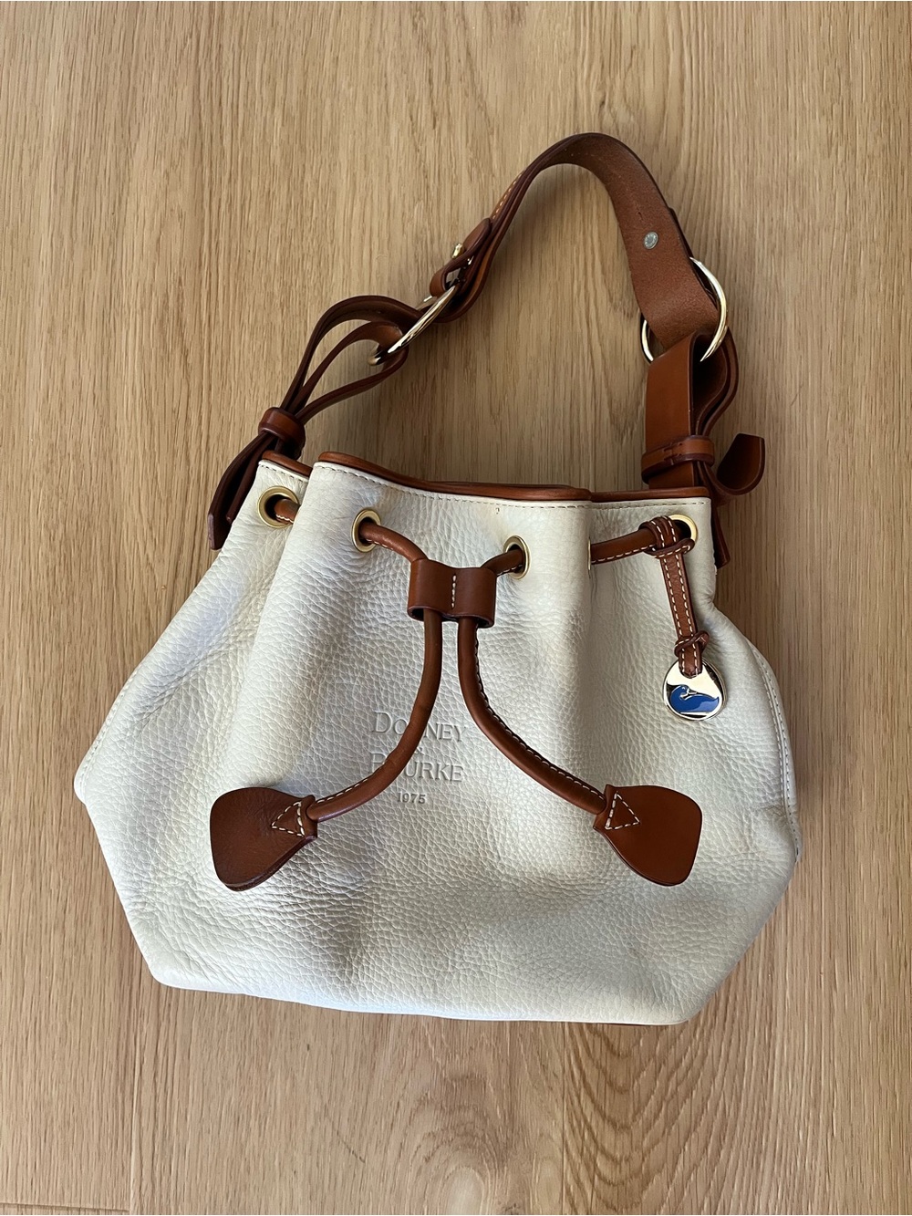 Dooney & Bourke Cream Pebble Leather Drawstring Shoulder Bag with Brown Trim